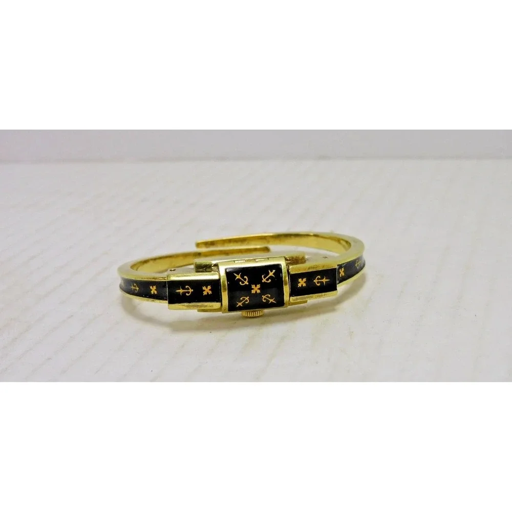 Vtg Swiss Hidden Face Watch Bangle Bracelet Black Enamel Gold Tone JC245
